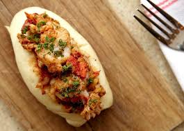 Eventide signature dishes Brown Butter Lobster RollNew England Clam ChowderFried Oyster BunThe Fish Sandwich